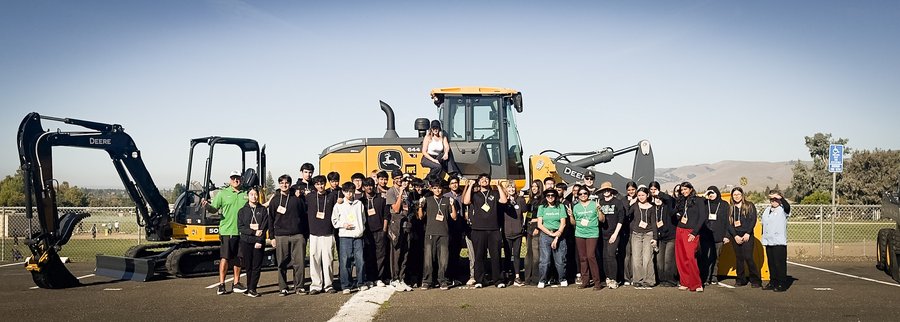 Students and MPPFA volunteers with John Deere excavator at Car Meet