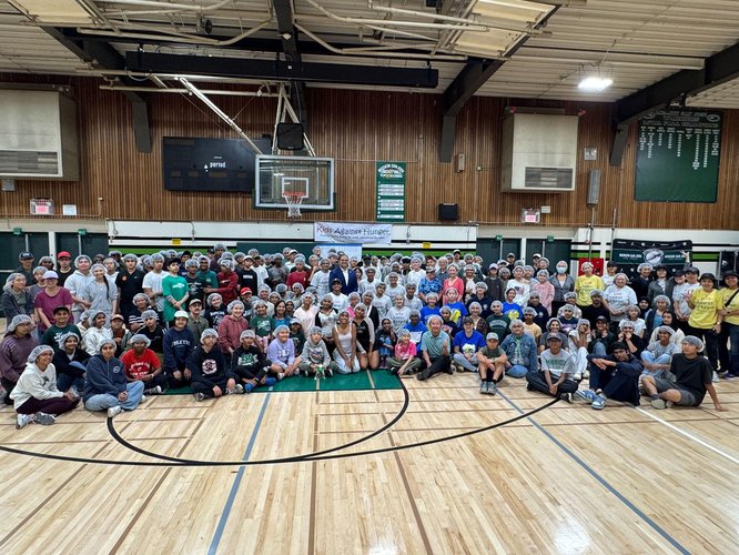 200+ volunteers at KAH Meal Packing in MSJHS gym