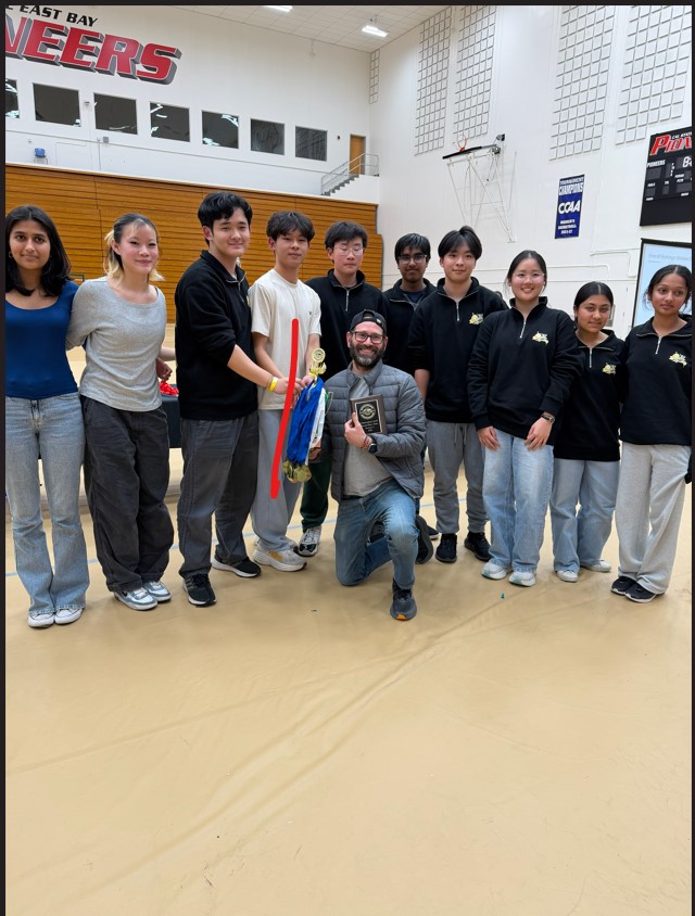 MSJHS Science Olympiad team with trophy